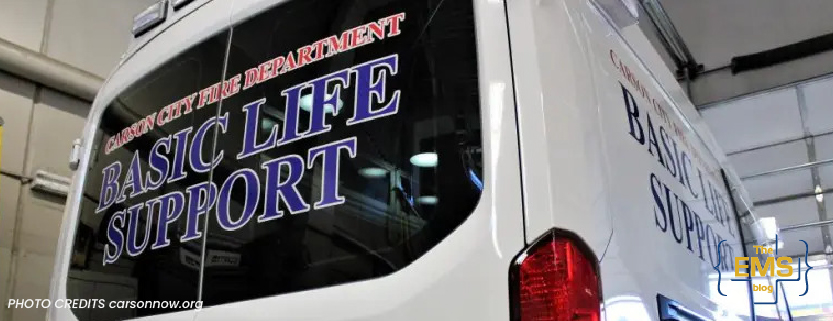 close-up-of-a-white-ambulance-marked-basic-life-support-from-the-carson-city-fire-department-parked-in-a-garage