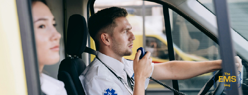 paramedic-communicating-via-radio-inside-ambulance-during-emergency-response
